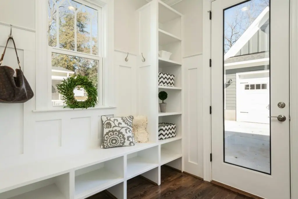 built in white mudroom cabinetry