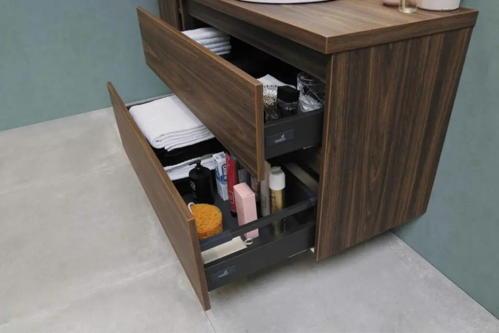 bathroom drawers with supplies inside