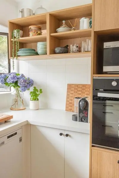 condominium kitchen counter cabinets and open top shelves