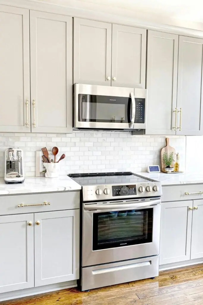 white cabinet with gold handle for small kitchen
