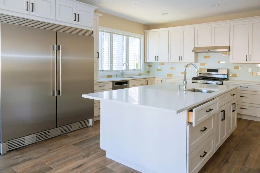 white modern custom kitchen with various cabinet installations